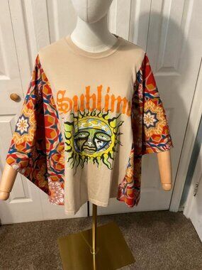 Graphic Beige Tee with Multicolor Patterned Sleeves